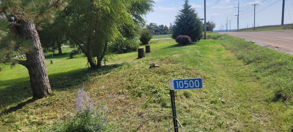 Roadside brush clearing and mowing service by Lovett lawn care & snow removal in Omaha, NE.