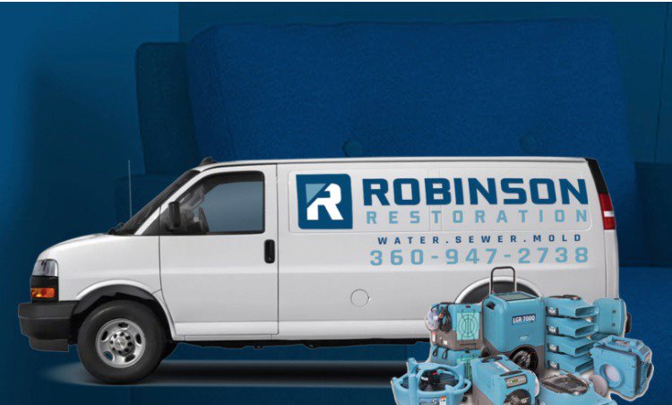 Robinson Restoration service van with water damage restoration equipment, including dehumidifiers and air movers, in Vancouver, WA