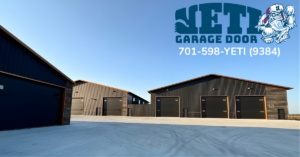 A row of commercial buildings featuring modern dark panel garage doors installed by YETI Garage Door in Moorhead, MN.