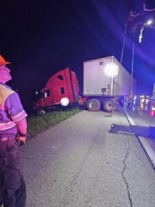McDowell Wrecker Service assisting with a semi-truck roadside recovery at night in Springfield, MO.