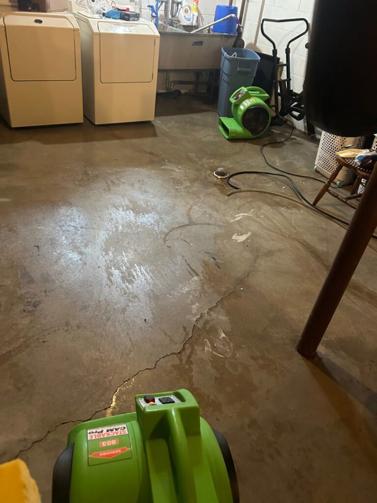 SERVPRO North Kenosha using air movers to dry a utility room after water damage in Kenosha, WI.