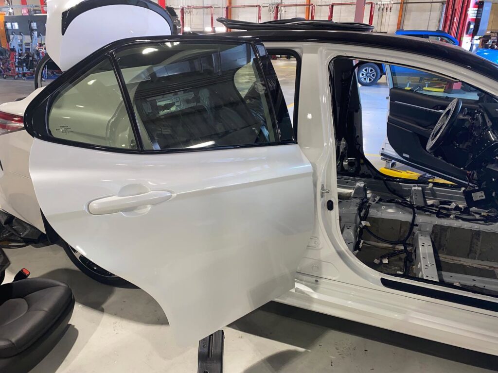 Servpro performing water damage restoration on a car interior with drying equipment in Honolulu, HI.