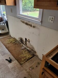 Severe water damage and mold growth in a kitchen requiring remediation by ABC Cleaning and Restoration in Harvest, AL.
