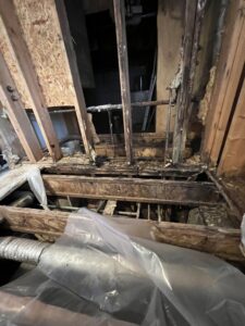 Severe water damage to floor joists and subflooring requiring remediation by Roy Briley General Contracting in Anchorage, AK.