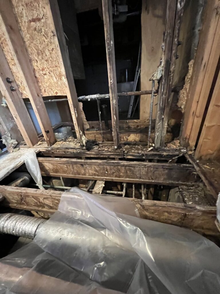 Severe water damage to floor joists and subflooring requiring remediation by Roy Briley General Contracting in Anchorage, AK.