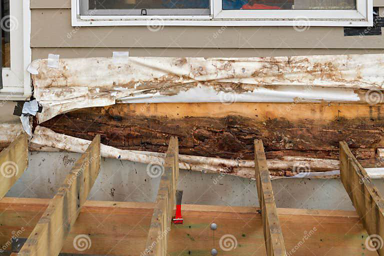 Severe water damage with rotted wood exposed on a house exterior, indicating a job for Double H Inspections in Sheridan, WY