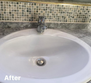 A shiny, clean bathroom sink faucet and basin after professional cleaning by Nicy Cleaning Service in Danbury, CT.