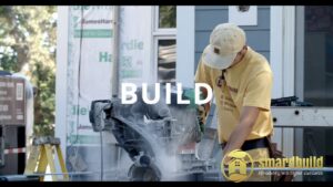 A siding contractor cutting material during a job for SmardBuild Siding and Exteriors in Naperville, IL