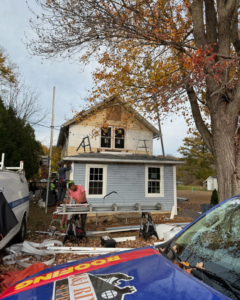 Siding installation in progress on a house by J&J Rivera Roofing and Supply Co in Old Saybrook, CT