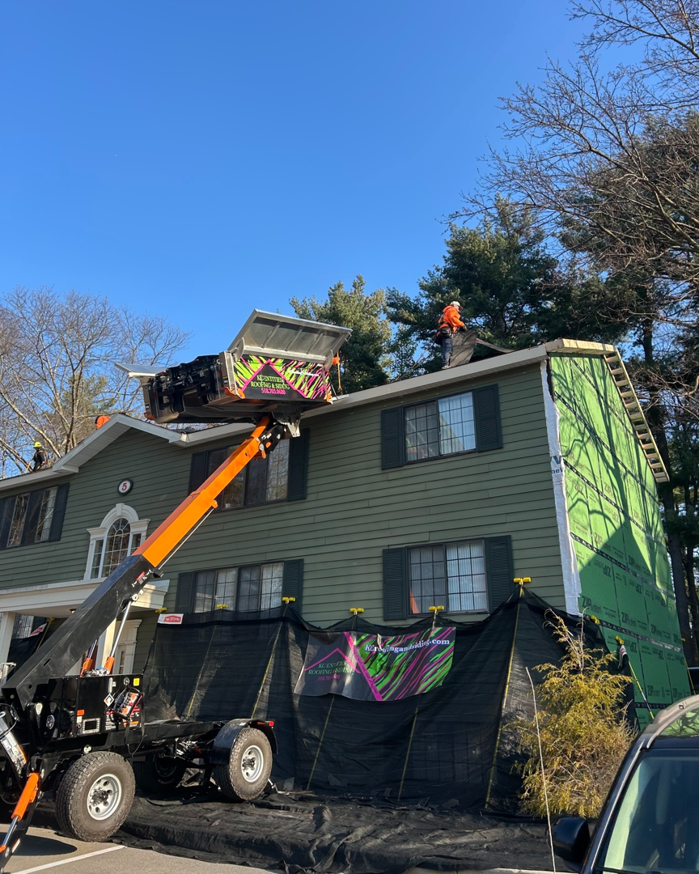 Siding preparation on a house with green ZIP System sheathing by KC Entities Roofing and Siding in Mechanicville, NY
