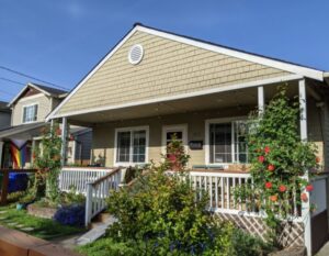 A charming small house with shake and horizontal siding by Lifetime Remodeling Systems in Portland, OR.