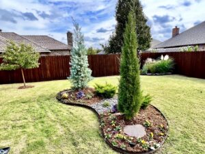 A residential driveway and path cleared of snow by DeLoera Total Lawncare in Oklahoma City, OK