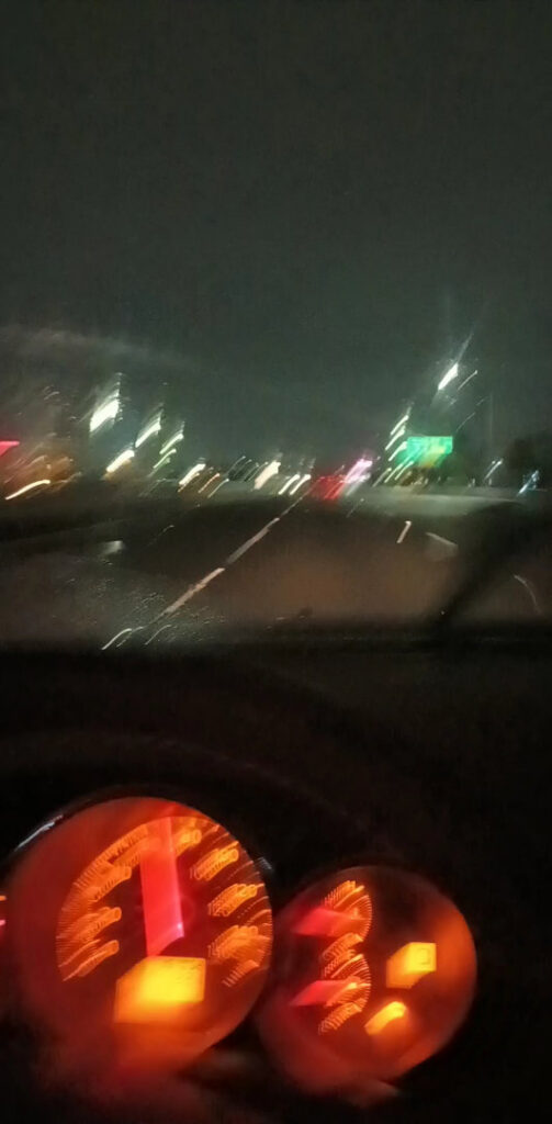 A snow-covered parking lot with a truck equipped with a snowplow, ready for snow removal by Town & Country Landscape Maintenance in Reno, NV.