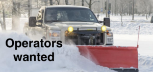 A white pickup truck with a red snow plow actively clearing snow from a road for Better Lawns & Snow Removal in Chatfield, MN.