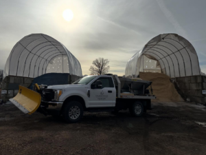 A snow plow truck with a salt spreader ready for winter service by M.J.D Landscape Solutions, LLC in West Hartford, CT.