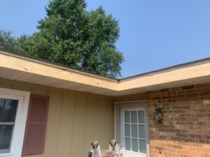 Close-up of soffit, fascia, and siding repair work on a house by Freeman Exteriors in Danville, IL.