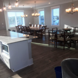 A spacious and clean dining room and kitchen area, reflecting the quality service of Active Cleaning in Virginia Beach, VA