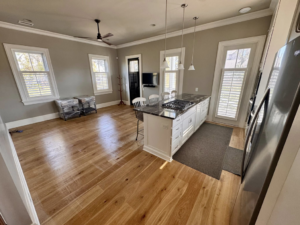 A spacious and clean kitchen and living area with bright windows, cleaned by Affordable Cleaning in North Charleston, SC.