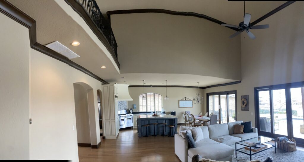 A spacious and clean open-concept living room and kitchen area, professionally cleaned by Inspire Clean OKC in Oklahoma City, OK.