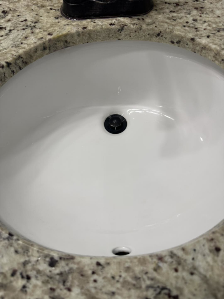 A sparkling clean bathroom sink after professional cleaning by Lake Area Cleaning Services in Lake Charles, LA