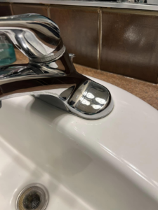 A sparkling clean bathroom sink faucet after professional cleaning by Idaho Gem Cleaning in Caldwell, ID.