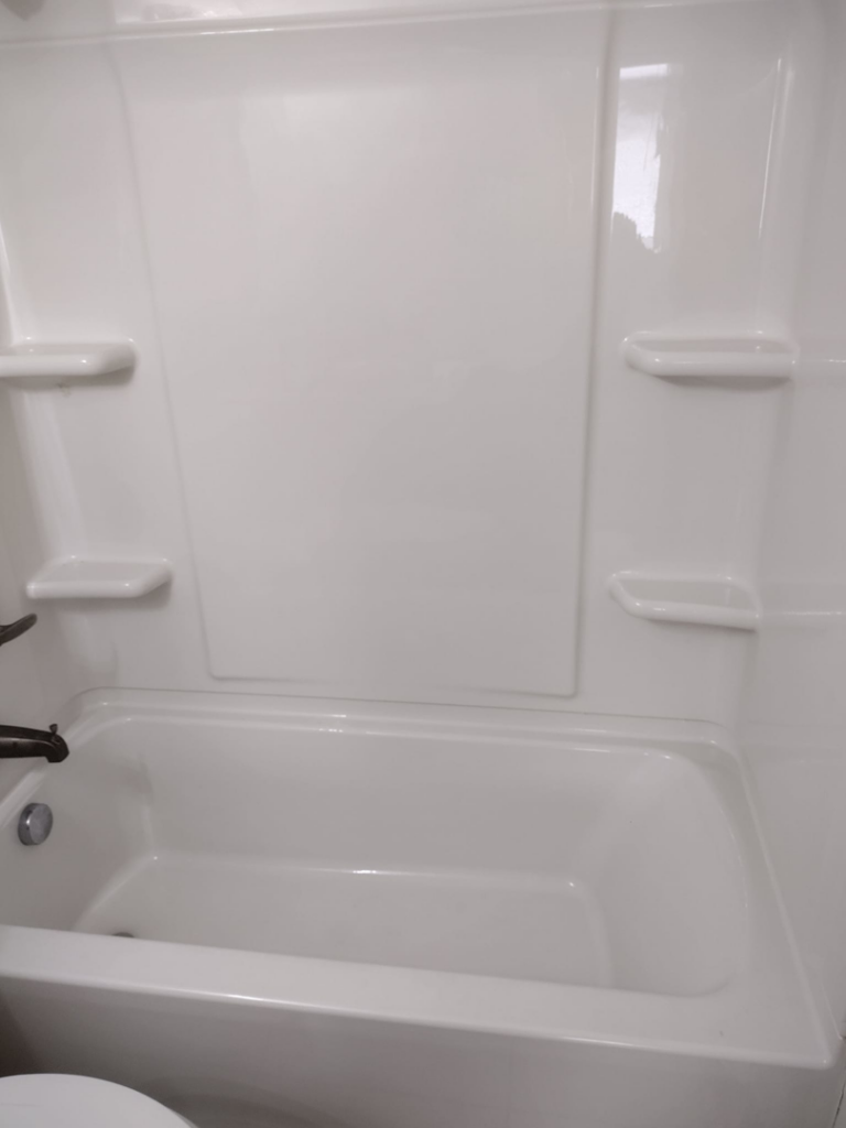 A sparkling clean bathtub after professional cleaning service by By Grace Cleaning Solutions, LLC in Cincinnati, OH.