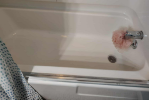 A sparkling clean bathtub after professional cleaning by Carissa's Green Cleaning LLC in Toledo, OH.