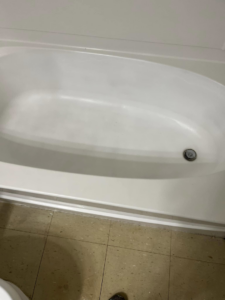 A sparkling clean bathtub after professional cleaning by Right Now Cleaning Services in Toledo, OH.