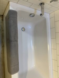 A sparkling clean bathtub, meticulously cleaned by Trust-Clean as part of their house cleaning services in Green Bay, WI.