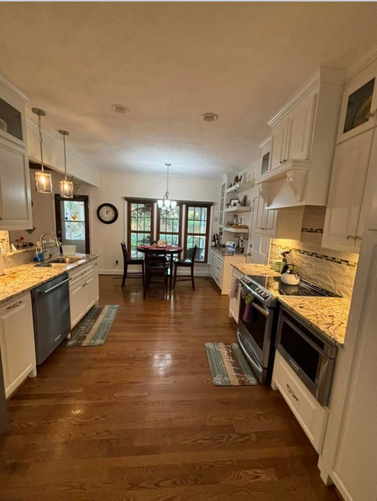 A sparkling clean kitchen and dining area, demonstrating the quality of service from Magic House Cleaning in Fayetteville, NC.