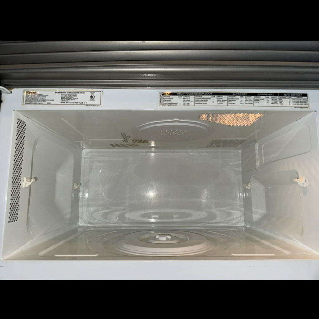 A sparkling clean microwave interior after professional cleaning by Prime Cleaners LLC in Kansas City, MO.