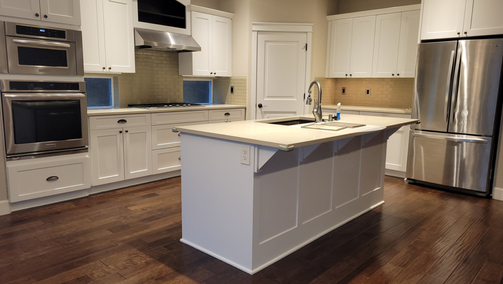 A sparkling clean modern kitchen, showcasing the quality house cleaning services by TNT Cleaning and Handyman Services LLC in Portland, OR.