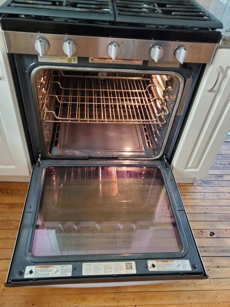A sparkling clean oven interior after a professional deep cleaning by City Cleaning Crew in Buffalo, NY.