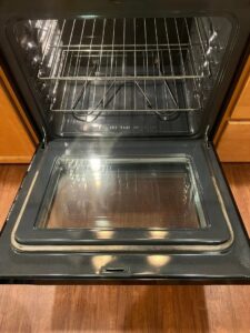 A sparkling clean oven interior with racks, showcasing the quality cleaning by Gem City Commercial and Residential Cleaning in Dayton, OH