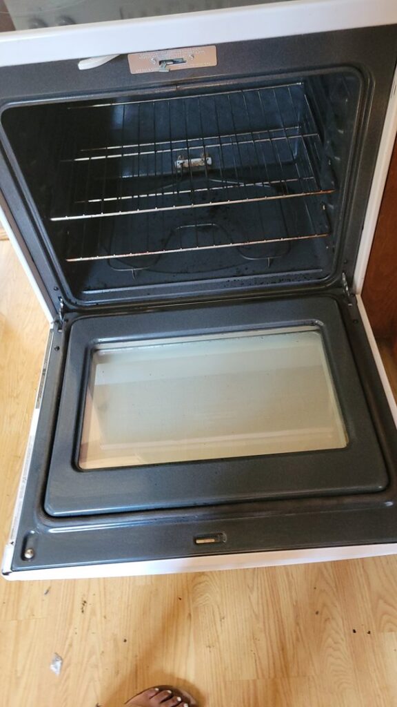 The sparkling clean interior of an oven, showcasing professional appliance cleaning by Solange D Kleaner in New Bedford, MA.