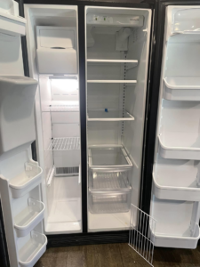 A sparkling clean and empty refrigerator interior after professional cleaning by VM Residential cleaning LLC in Baton Rouge, LA.