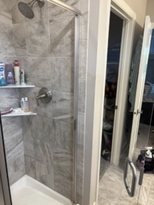 A sparkling clean shower after professional cleaning by Warm & Cozy House Cleaning in Madison, WI