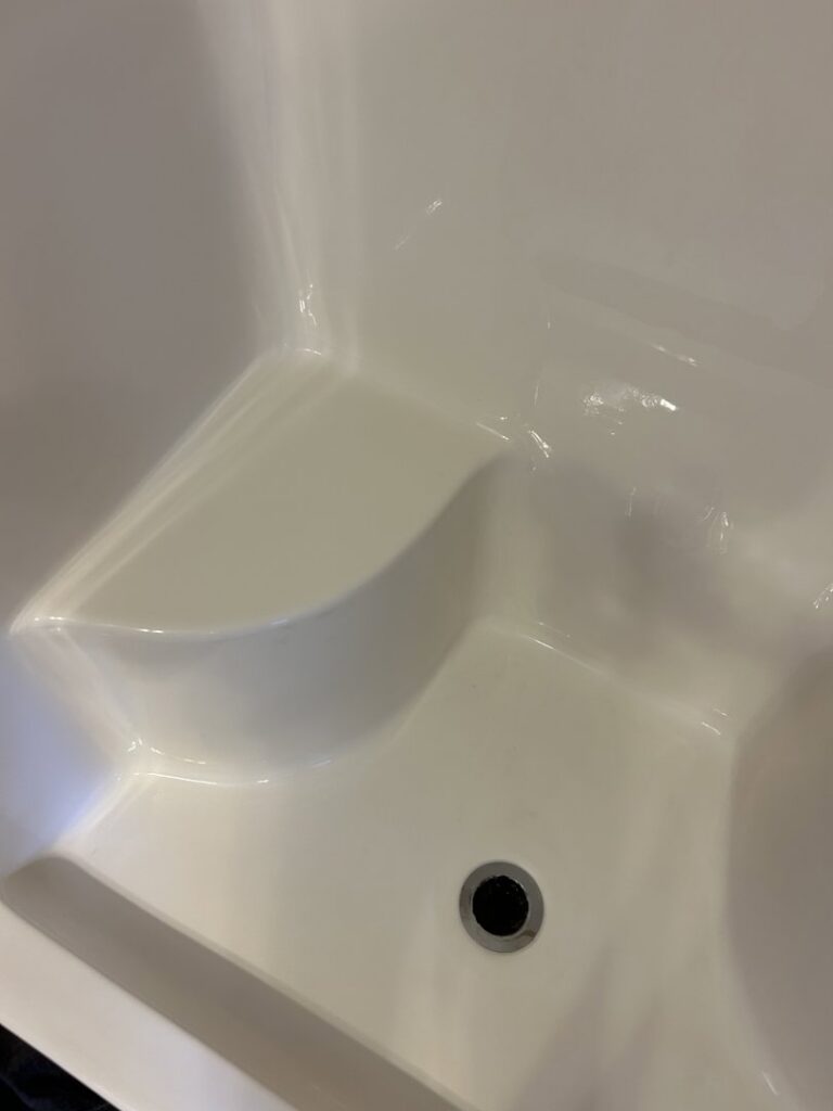A sparkling clean shower stall after professional deep cleaning by We Maid It Two Cleaning Services LLC in Owensboro, KY.