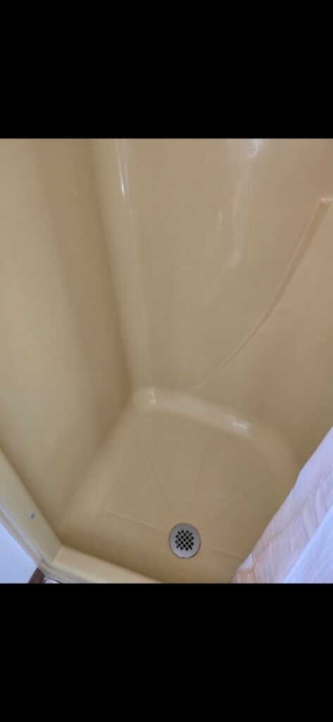 A sparkling clean shower stall after professional cleaning service by MJ Commercial & Residential Cleaning, LLC in Cedar Rapids, IA.