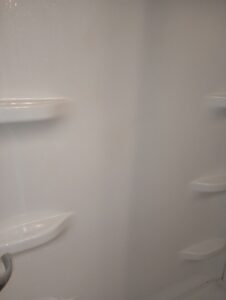 A sparkling clean shower stall, meticulously cleaned by Mama's Touch Cleaning Service LLC for homes in Evansville, IN.