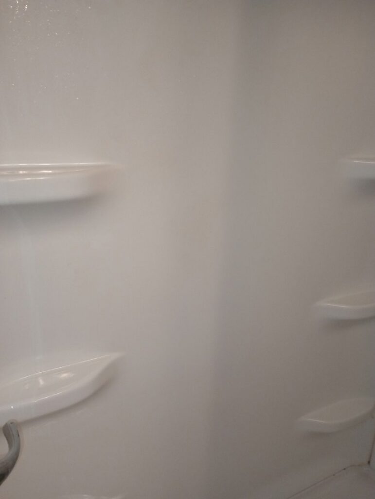 A sparkling clean shower stall, meticulously cleaned by Mama's Touch Cleaning Service LLC for homes in Evansville, IN.