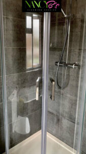 A sparkling clean shower stall with glass doors by Nancy B's Cleaning Service LLC in Atlanta, GA.