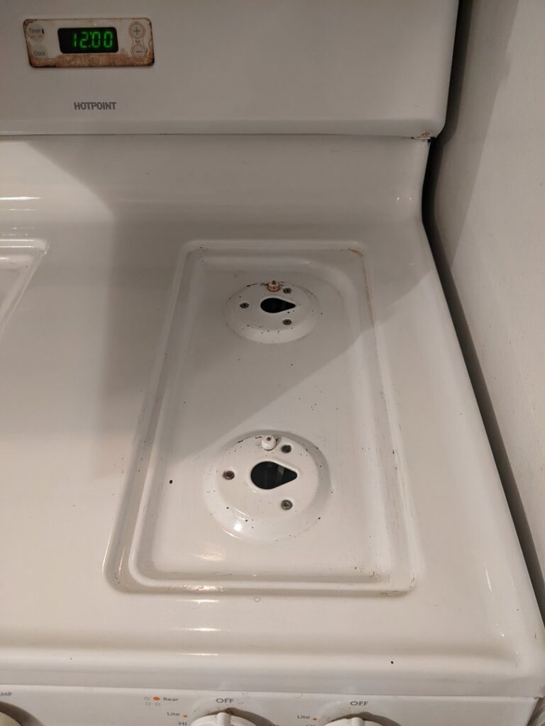 A sparkling clean stovetop, showcasing the excellent results of Chelle's Cleaning Services in Gary, IN.