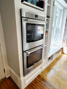 A spotless stainless steel double oven, demonstrating professional appliance cleaning by AMS Cleaning LLC in Iowa City, IA