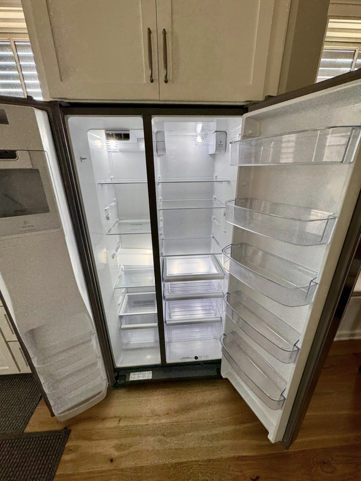 A spotless and empty refrigerator interior, thoroughly cleaned by Affordable Cleaning in North Charleston, SC.