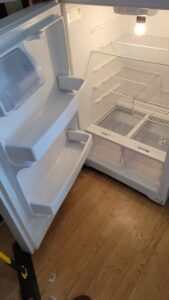 A spotless and empty refrigerator, demonstrating thorough interior cleaning services by Solange D Kleaner in New Bedford, MA.