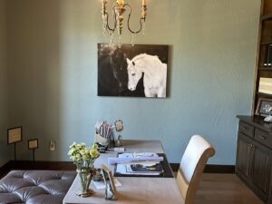 A spotless and organized home office with a desk and elegant decor, cleaned by Inspire Clean OKC in Oklahoma City, OK.