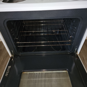 A spotless oven interior after professional cleaning, demonstrating the quality work of Christina's Tidy Homes in Canton, OH.