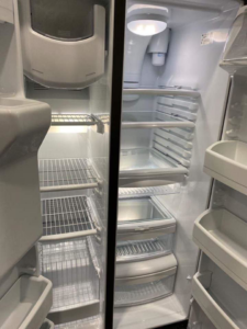A spotless and thoroughly cleaned oven interior with gleaming racks, demonstrating the quality work of Fresh Start Residential cleaning services LLC in Cary, NC.