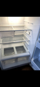 A spotless and thoroughly cleaned refrigerator interior, a result of professional house cleaning by Elizabeth's cleaning in Cedar Park, TX.